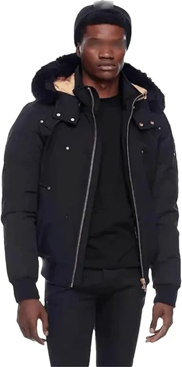 Navy Moose Knuckles winter down jacket.
