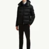 Moncler winter down jacket with logo detail.